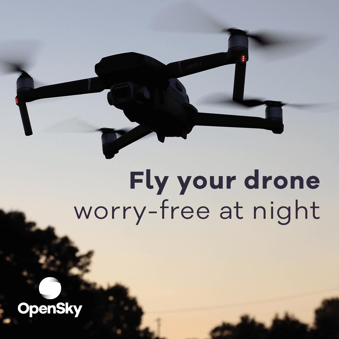 A drone flies in the twilight sky above silhouetted trees, accompanied by the text "Fly your drone worry-free at night," and the OpenSky logo in the corner.