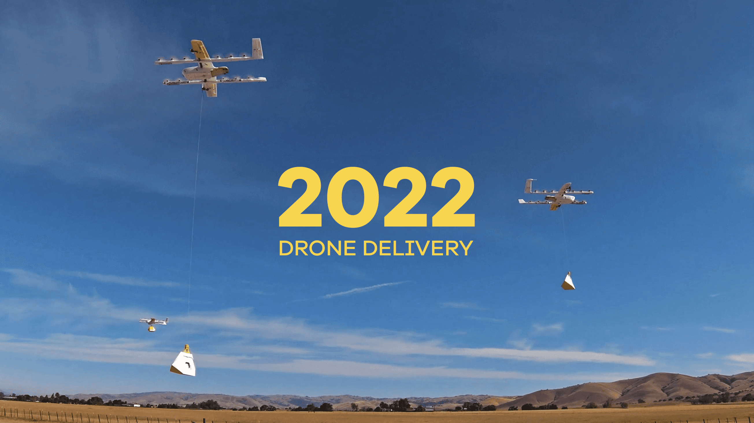 A drone flies through a clear blue sky with the sun shining, carrying a package below, with the year "2022" prominently displayed in bold yellow text.